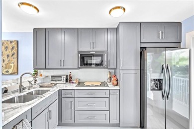 Come live on the beach in this private, boutique building. New