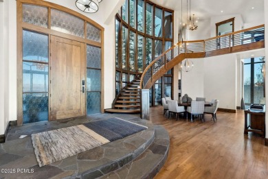 Located in the prestigious gated community of Deer Crest Estates