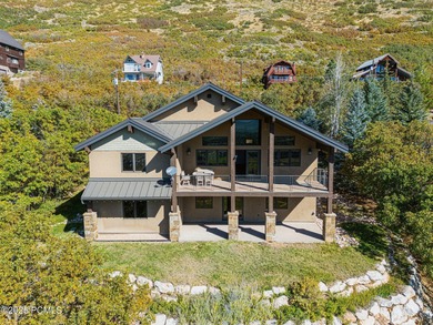 Nestled on the hillside above Midway with 22,000 acres of