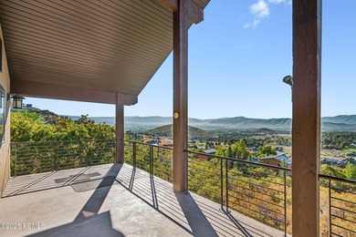 Nestled on the hillside above Midway with 22,000 acres of