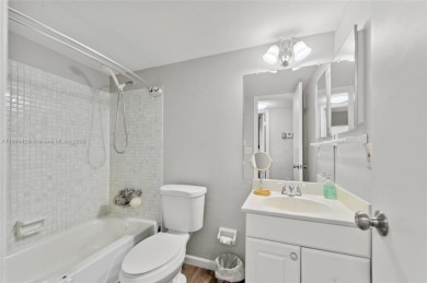 Welcome to this charming ground-floor 2-bed, 2-bath condo in the