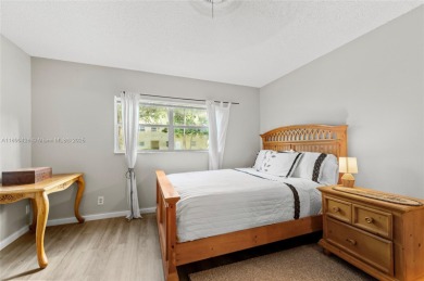 Welcome to this charming ground-floor 2-bed, 2-bath condo in the