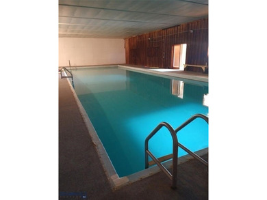 Soak it up daily with your very own indoor pool! This 3 bed/3