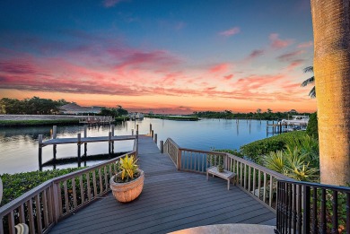 Introducing a palatial waterfront estate on a double lot in the
