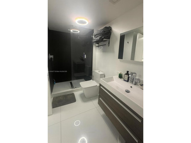 Welcome to this beautifully maintained 2-bedroom, 2-bath