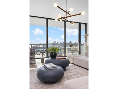 Experience elevated coastal living in Residence 2802 at Five