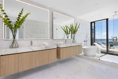 Experience elevated coastal living in Residence 2802 at Five