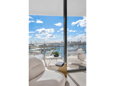 Experience elevated coastal living in Residence 2802 at Five