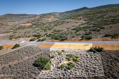 Positioned on one of Jordanelle Ridge's premier view lots, this