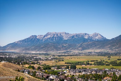 Positioned on one of Jordanelle Ridge's premier view lots, this