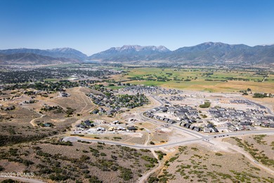 Positioned on one of Jordanelle Ridge's premier view lots, this