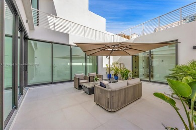 Built in 2021, this 7 bedroom, 5.5 bathroom townhouse has all of