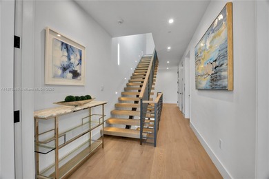 Built in 2021, this 7 bedroom, 5.5 bathroom townhouse has all of