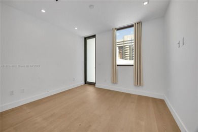 Built in 2021, this 7 bedroom, 5.5 bathroom townhouse has all of