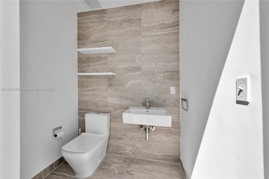 Built in 2021, this 7 bedroom, 5.5 bathroom townhouse has all of