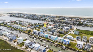 Luxurious Island Living in Sunset Beach: A Stunning 6-Bedroom, 6