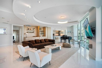 Welcome to this one-of-a-kind PENTHOUSE residence located in the