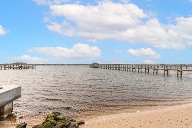 Experience the pinnacle of coastal living in this stunning