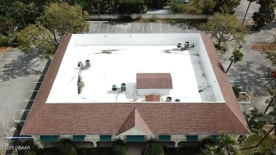 With over 200 feet of front exposure located on the east side of