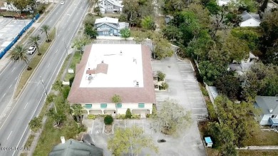 With over 200 feet of front exposure located on the east side of