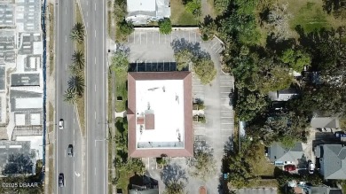 With over 200 feet of front exposure located on the east side of