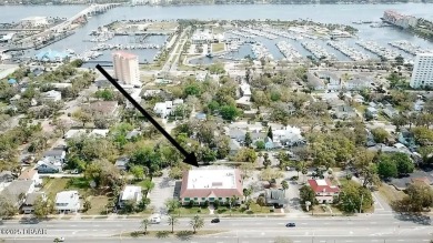 With over 200 feet of front exposure located on the east side of