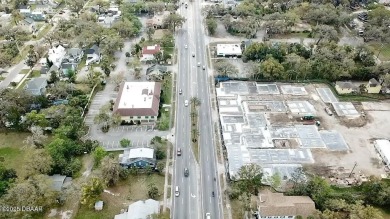 With over 200 feet of front exposure located on the east side of