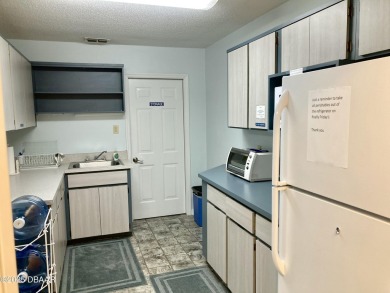 With over 200 feet of front exposure located on the east side of