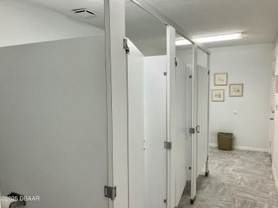 With over 200 feet of front exposure located on the east side of