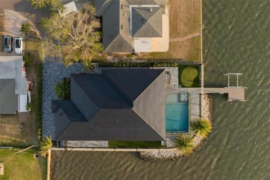 Set on a corner lot with over 200 feet of waterfront, this