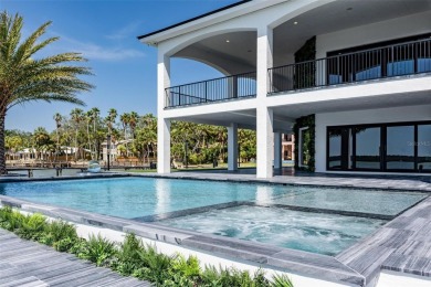 Set on a corner lot with over 200 feet of waterfront, this