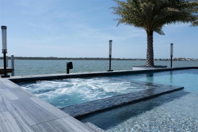 Set on a corner lot with over 200 feet of waterfront, this