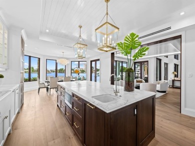 Live the true *South Florida Lifestyle* on this island's gated