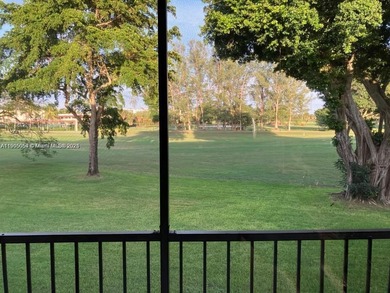 Enjoy the beautiful golf course views from this updated