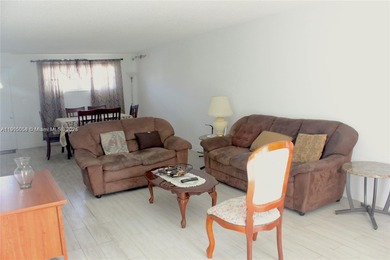 Enjoy the beautiful golf course views from this updated