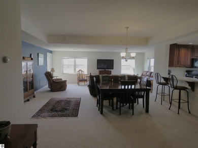 This charming condo offers stunning, expansive views of Lake