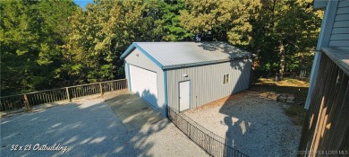 Wonderful 3 bdrm 2 bath home with large outbuilding in the very