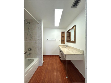 Welcome to this bright, freshly painted, and clean 2-bedroom