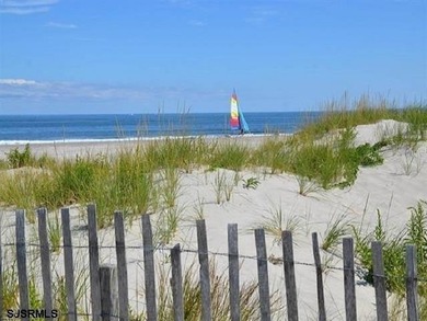 Discover beachside living at its finest with this beautifully