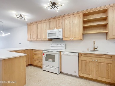 ABSOLUTELY STUNNING! THIS RECENTLY RENOVATED CONDO IS DIRECTLY