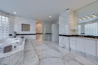 This striking three story, 7000+ square foot residence is