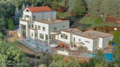 This striking three story, 7000+ square foot residence is