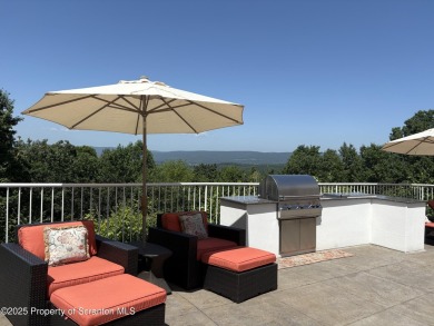 This striking three story, 7000+ square foot residence is