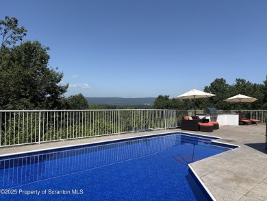 This striking three story, 7000+ square foot residence is