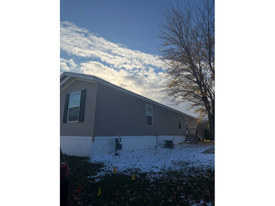 This stunning 2022 mobile home has been kept in excellent