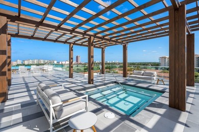 Experience Boca's Beauty from this Lanai Residence with a