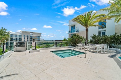Experience Boca's Beauty from this Lanai Residence with a