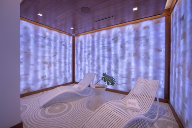 Experience Boca's Beauty from this Lanai Residence with a