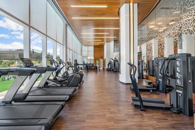 Experience Boca's Beauty from this Lanai Residence with a