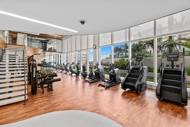 Experience Boca's Beauty from this Lanai Residence with a